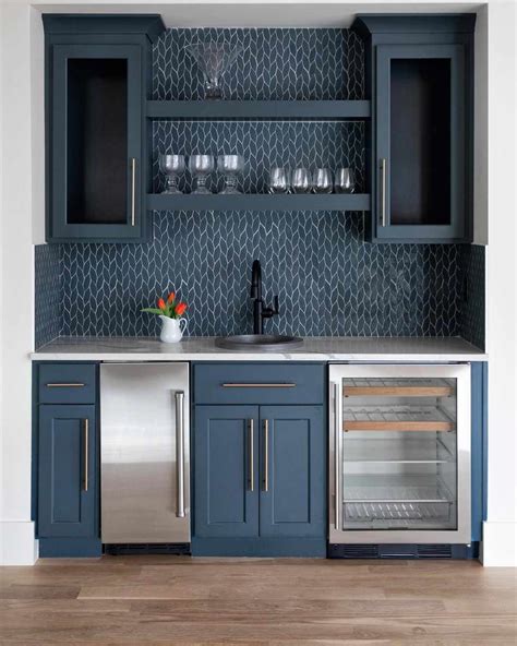 Wet bars - We are considering installing a wet bar during our upcoming first floor renovation. However, when I was chatting with a local realtor about this, she said that wet bars are going out of style and most new construction upper price homes aren't being with them anymore. We are wine drinkers, and wouldn't use the wet bar except for entertaining, so ...